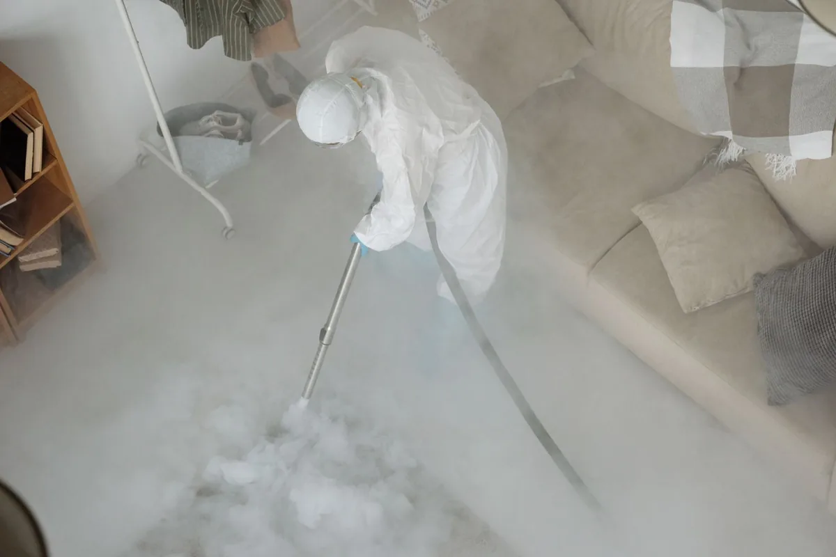 Biohazard cleanup technician in protective equipment, Liberty, NY
